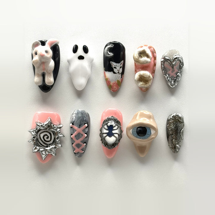 Victorian Hallows Eve press-on nails: ten pink, black and chrome almonds with a sculpted bunny, ghost, spider cameo and 3D eye